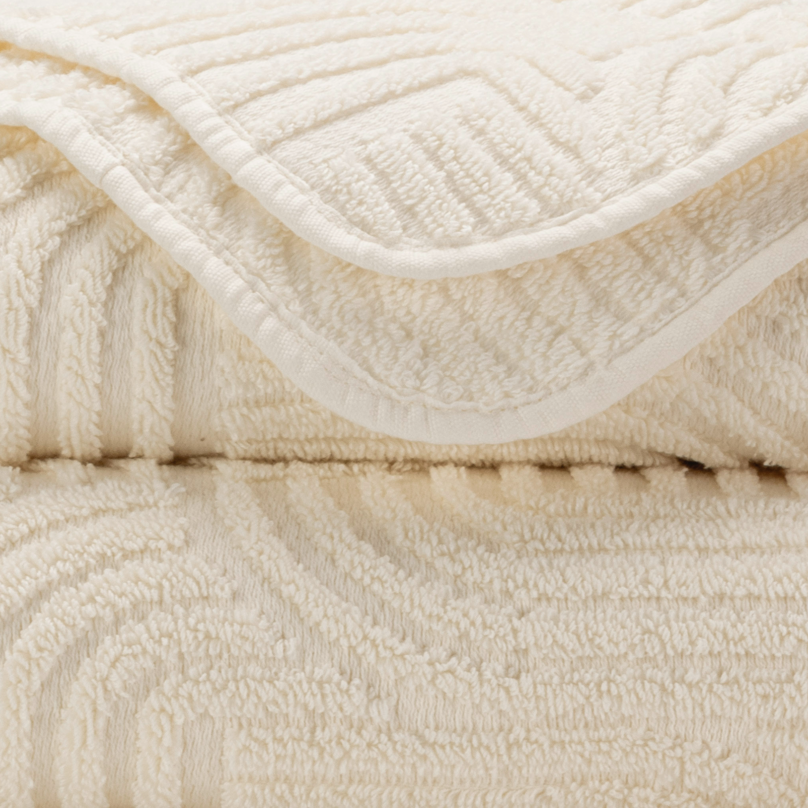 Lifestyle Image of Abyss Olly Bath Towels Both Colors