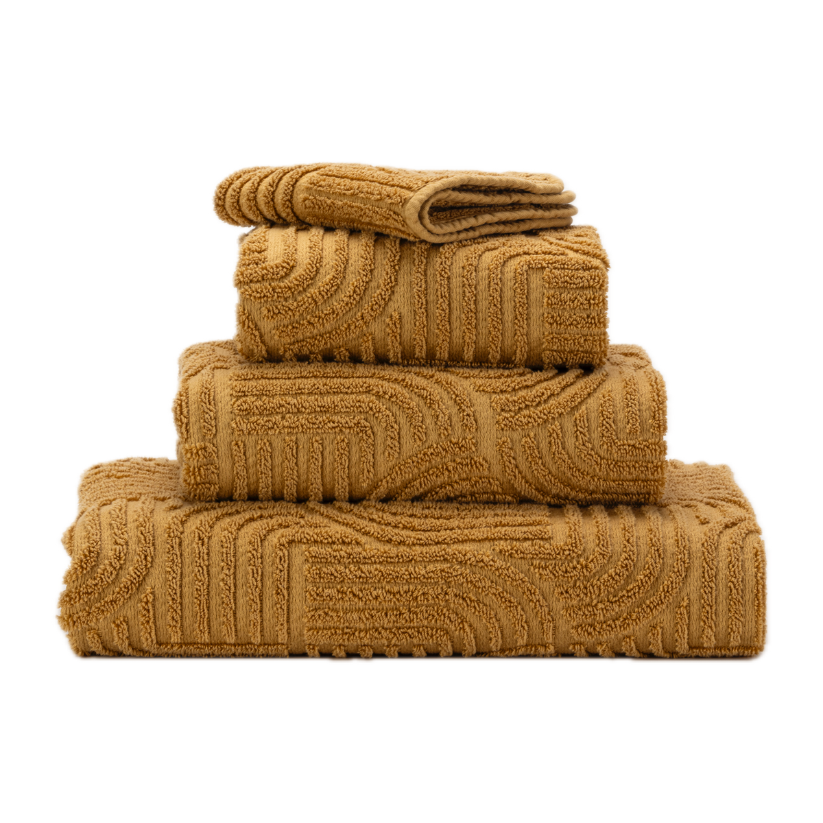 Stack of Abyss Olly Bath Towels in Gold Color