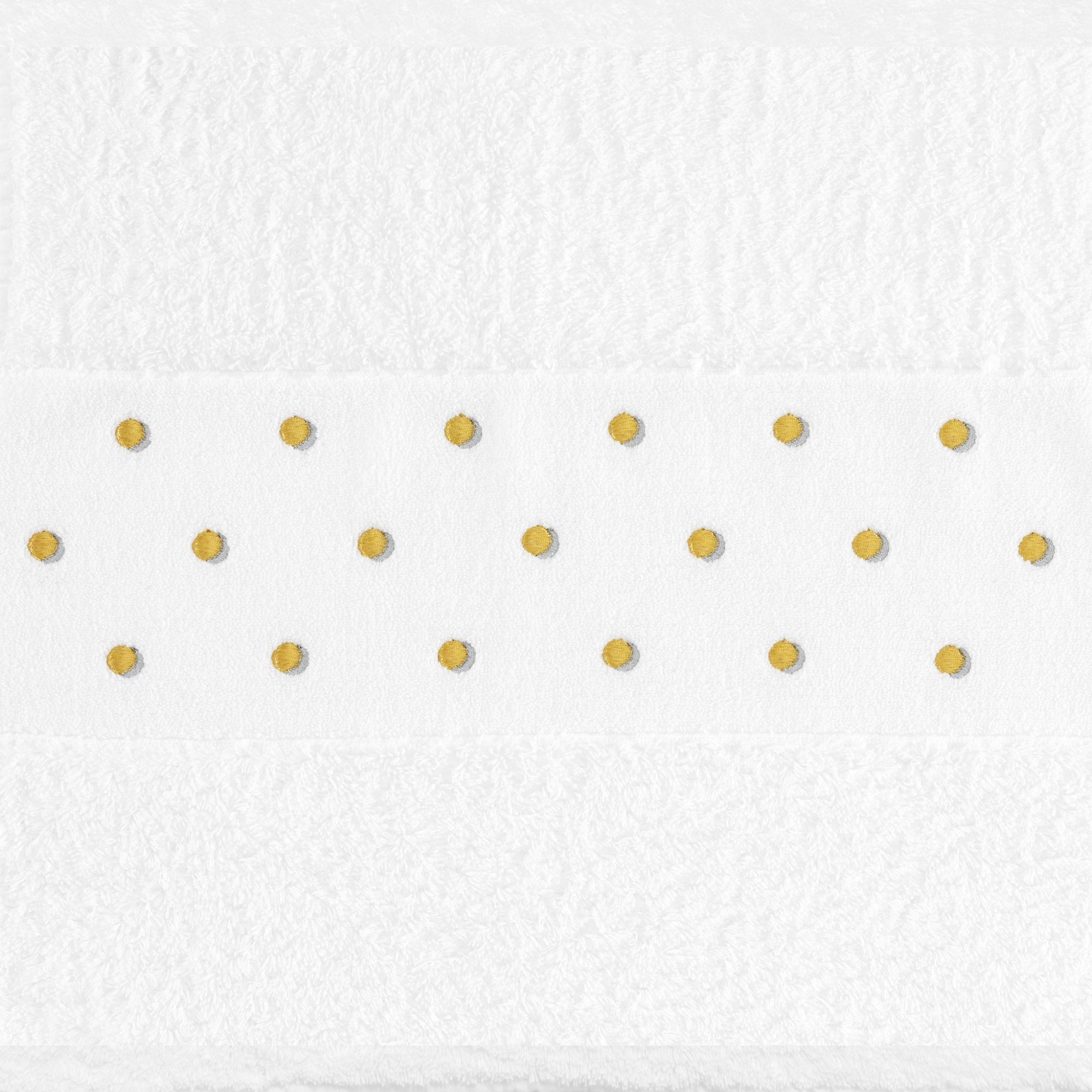 Abyss Pintas Embroidered Towel in a bathroom setting