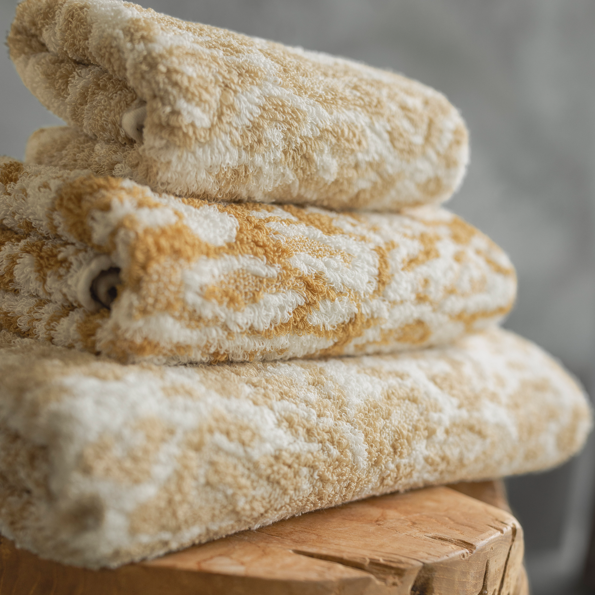 Lifestyle Image of Abyss Sauvage Bath Towels in Sand Color