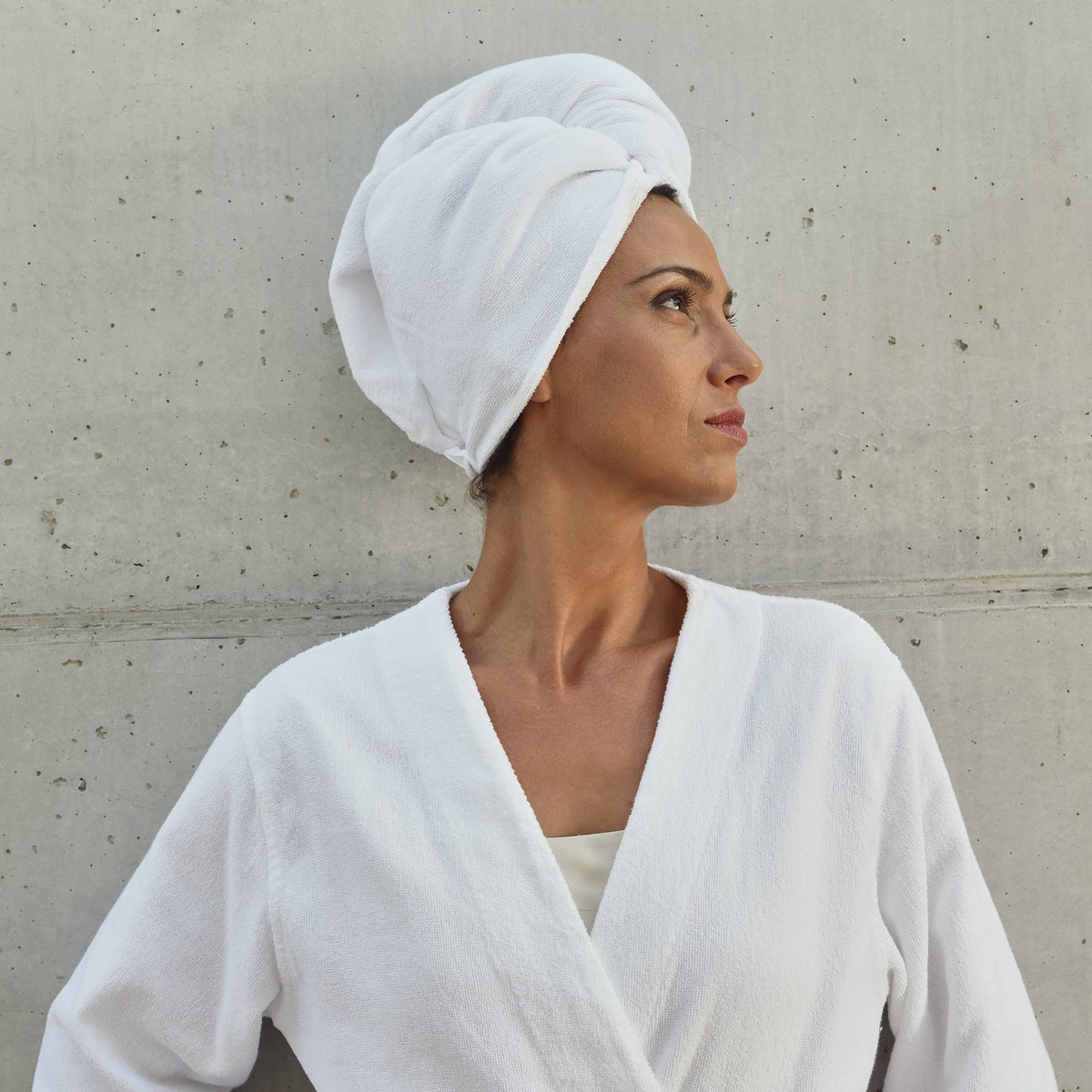 Model Wearing Abyss Spa Hair Towel in Color White (100)