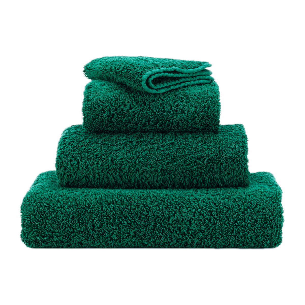 Stack of Abyss Super Pile Bath Towels in British Green Color