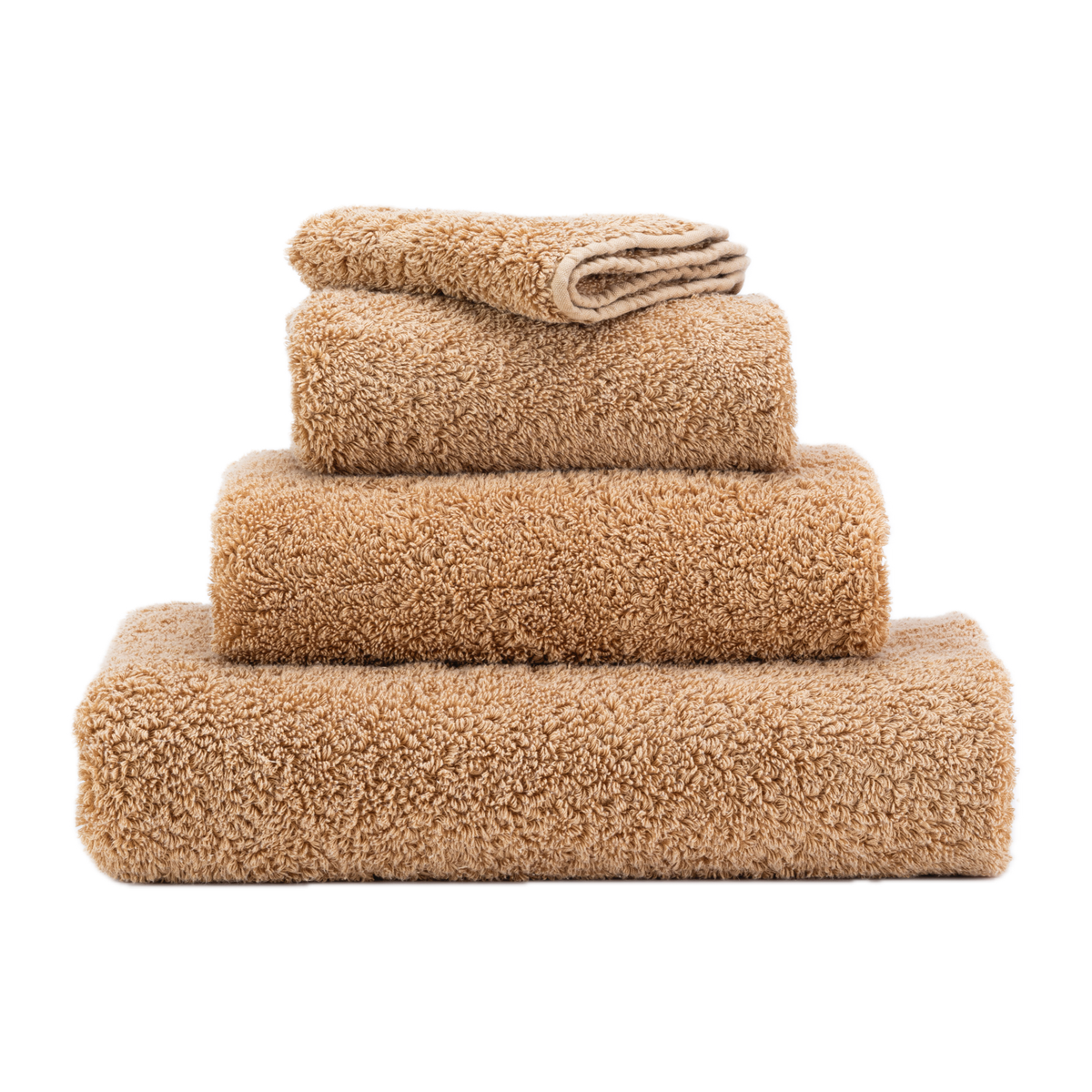 Stack of Abyss Super Pile Bath Towels in Croissant Color