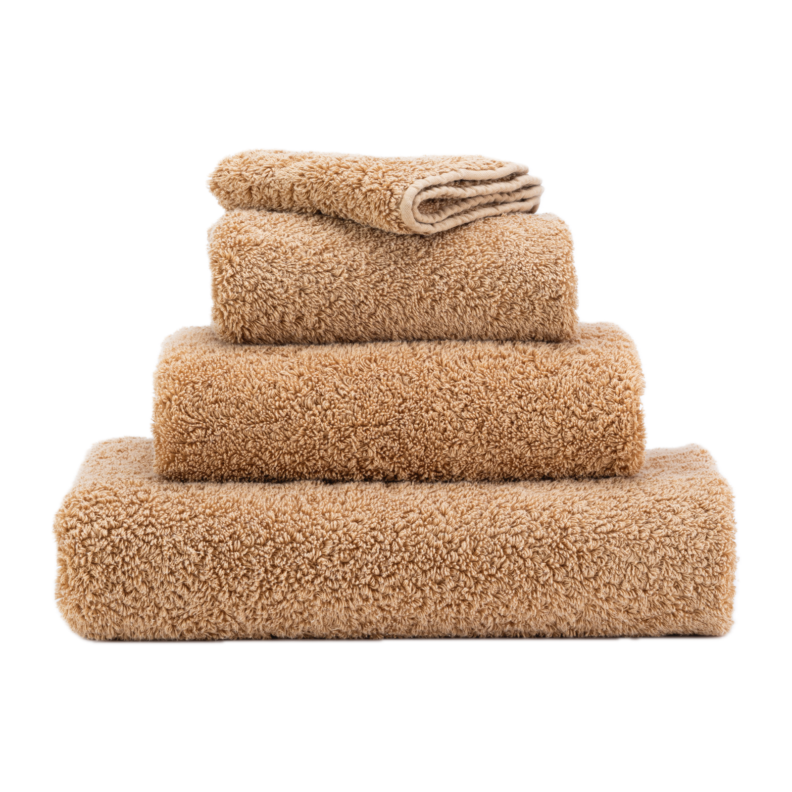 Stack of Abyss Super Pile Bath Towels in Croissant Color