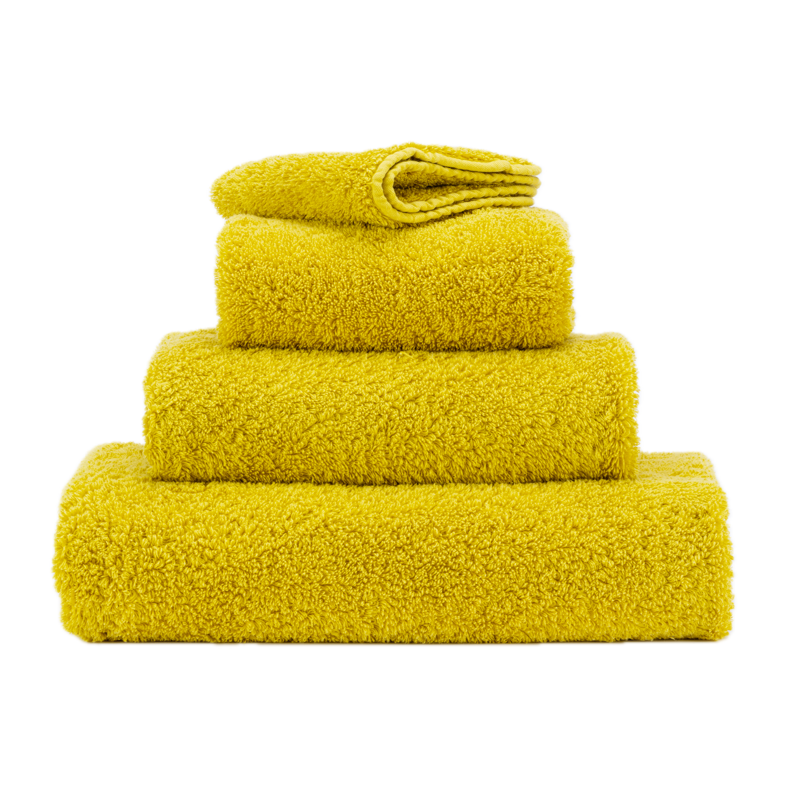 Stack of Abyss Super Pile Bath Towels in Yuzu Color