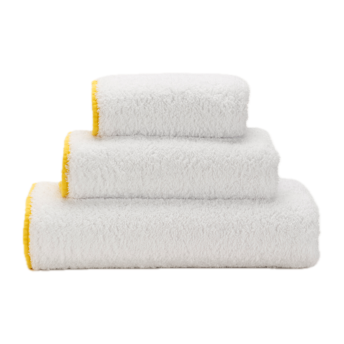 Stack of Abyss Surf Bath Towels in Banana Color