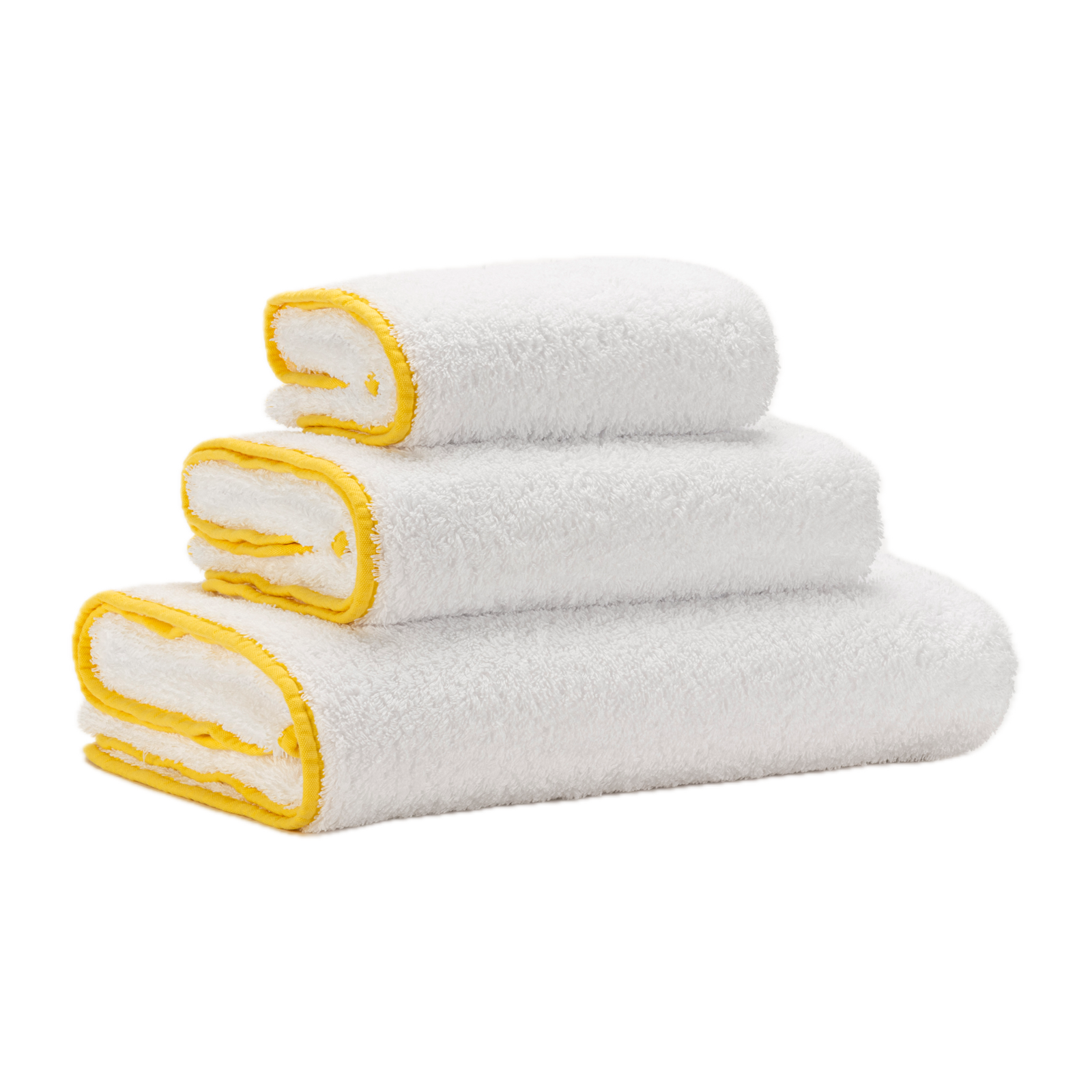 Tilted Stack of Abyss Surf Bath Towels in Banana Color