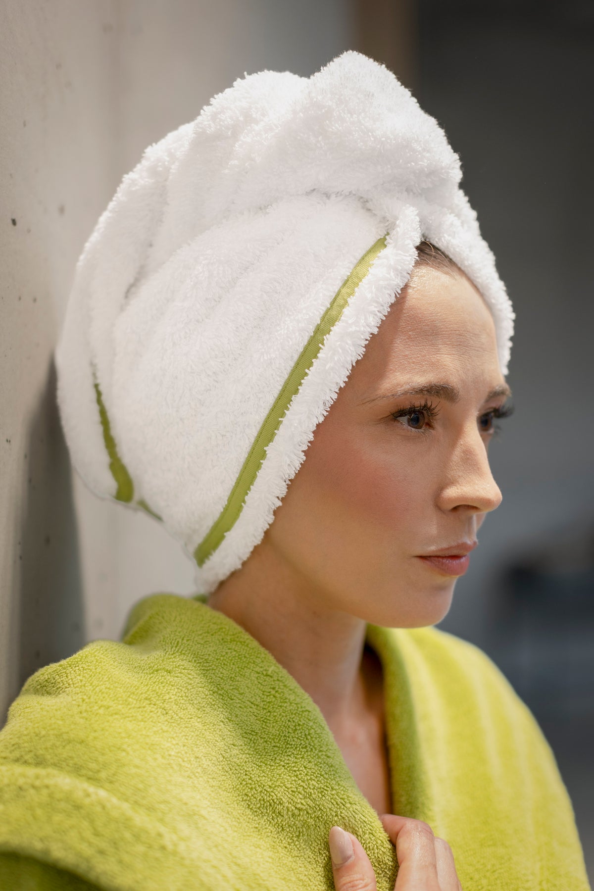 Model Wearing Abyss Surf Hair Towel in Color Apple Green (165)