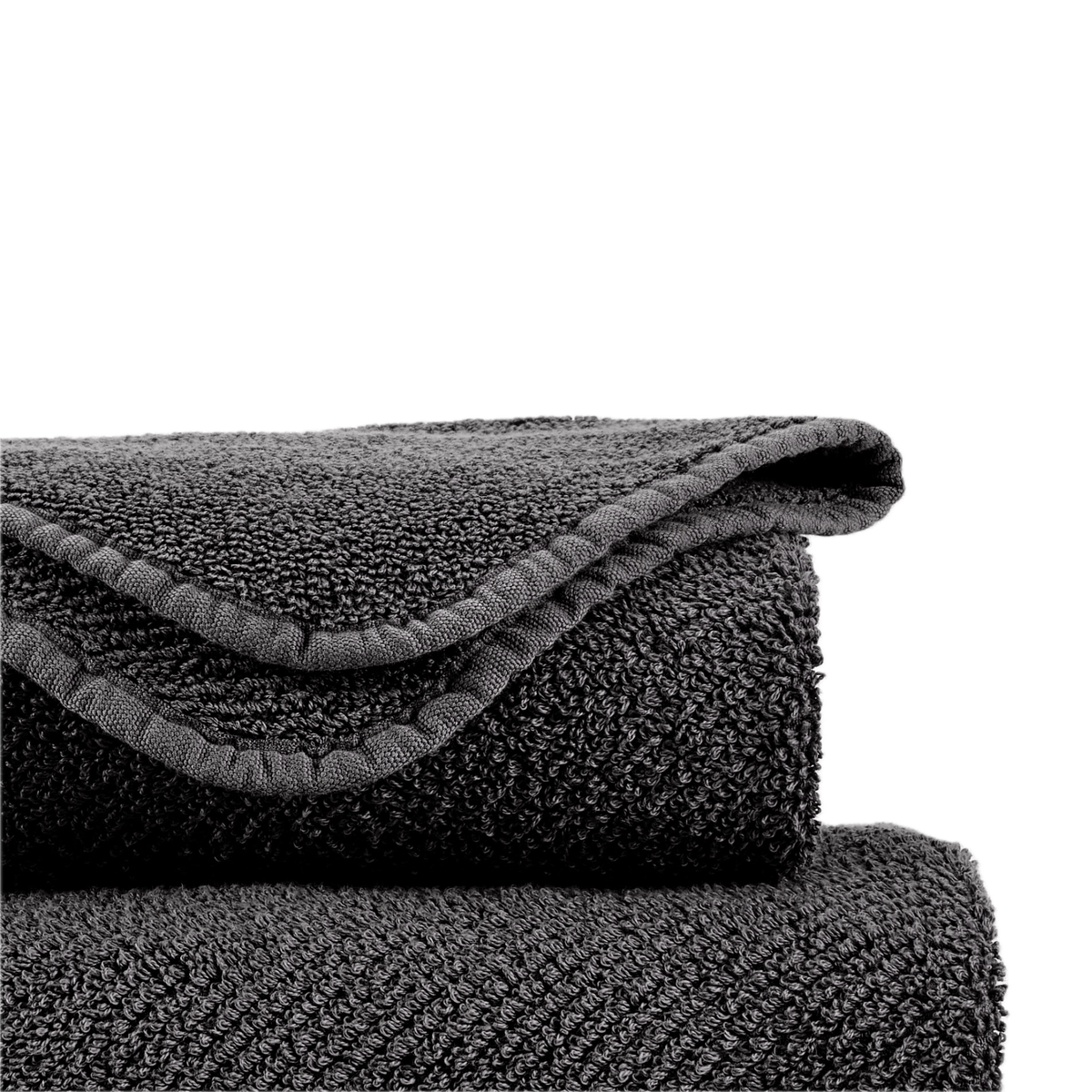 Closeup of Stack of Abyss Twill Bath Towels in Volcan Color