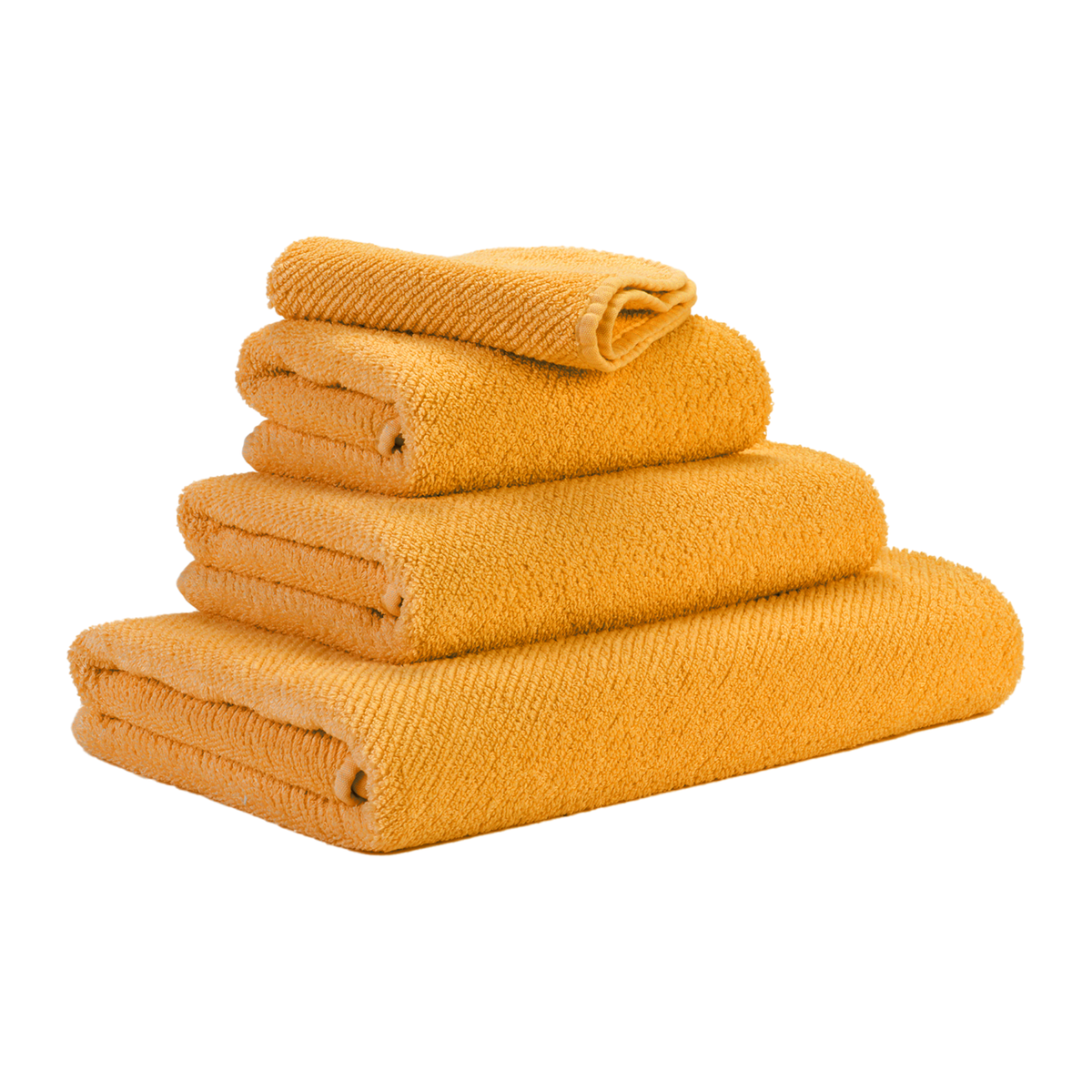 Tilted Stack of Abyss Twill Bath Towels in Curcuma Color