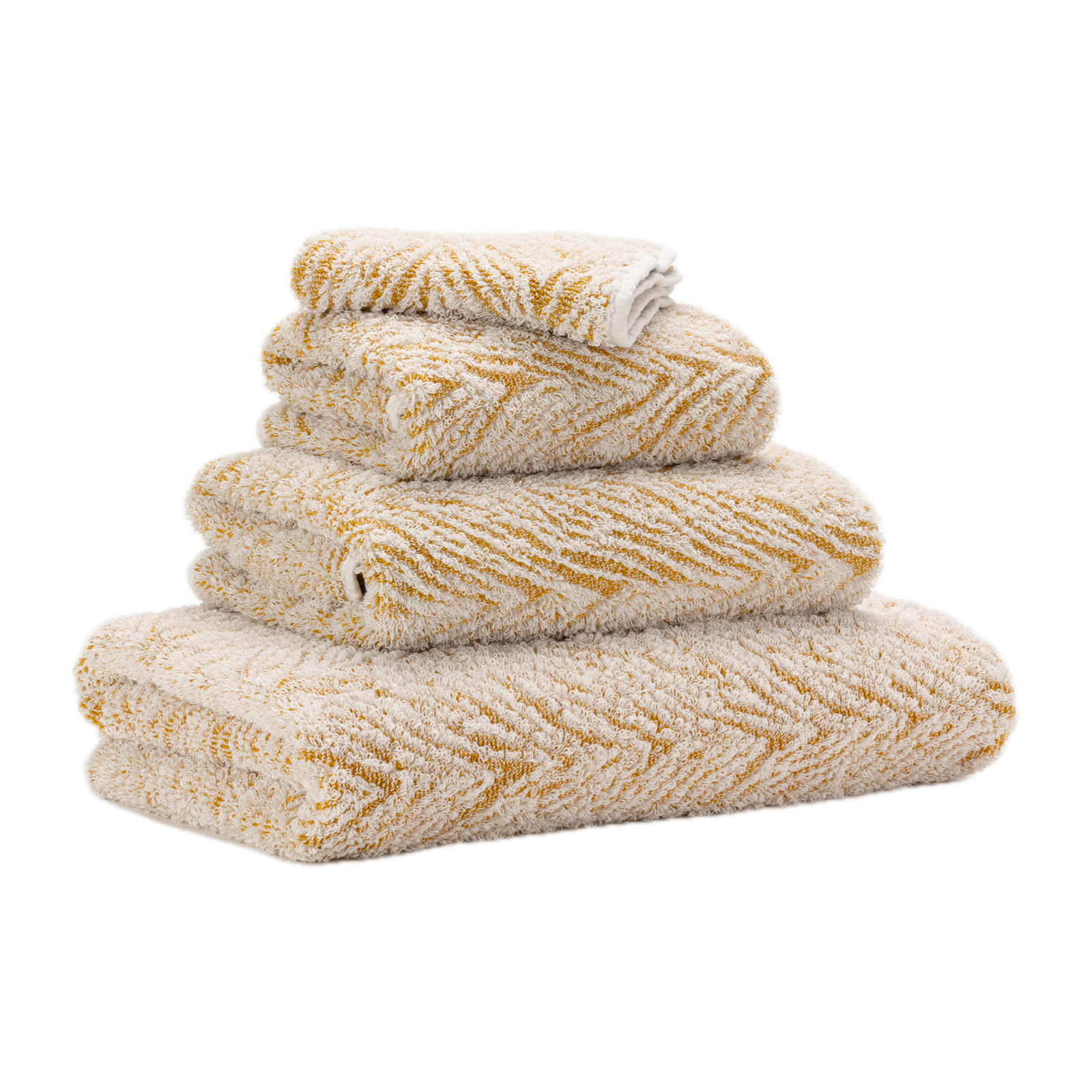 Tilted Stack of Abyss Vasco Bath Towels in Gold Color