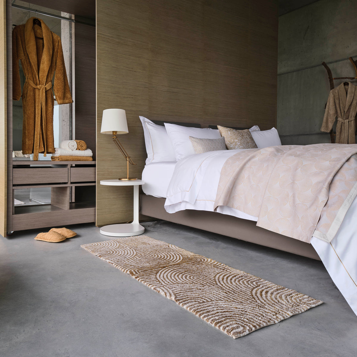 Abyss Habidecor Petal Bath Rug - lifestyle next to bed