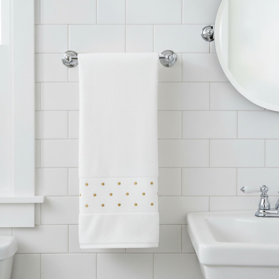 Abyss Pintas Embroidered Towel in a bathroom setting