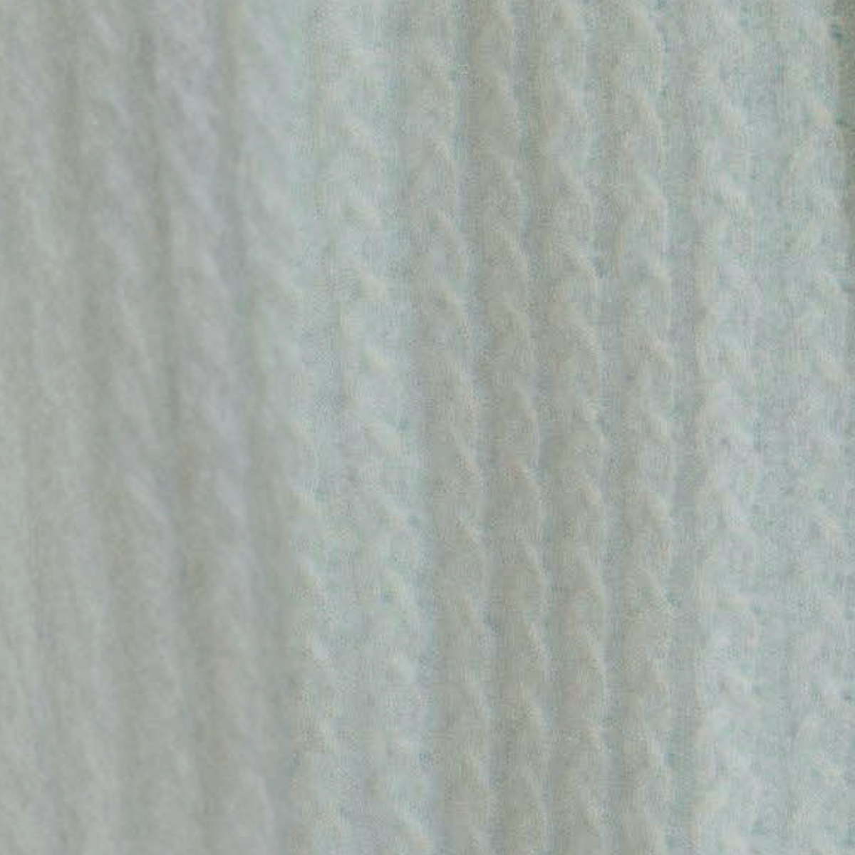 Fabric Closeup of Alashan Bailey Braided Cable Knit Baby Blanket in Bliss 