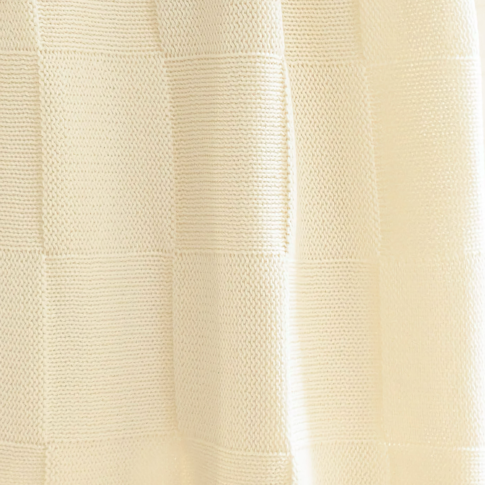 Stack of Alashan Charlie Knit Baby Blankets