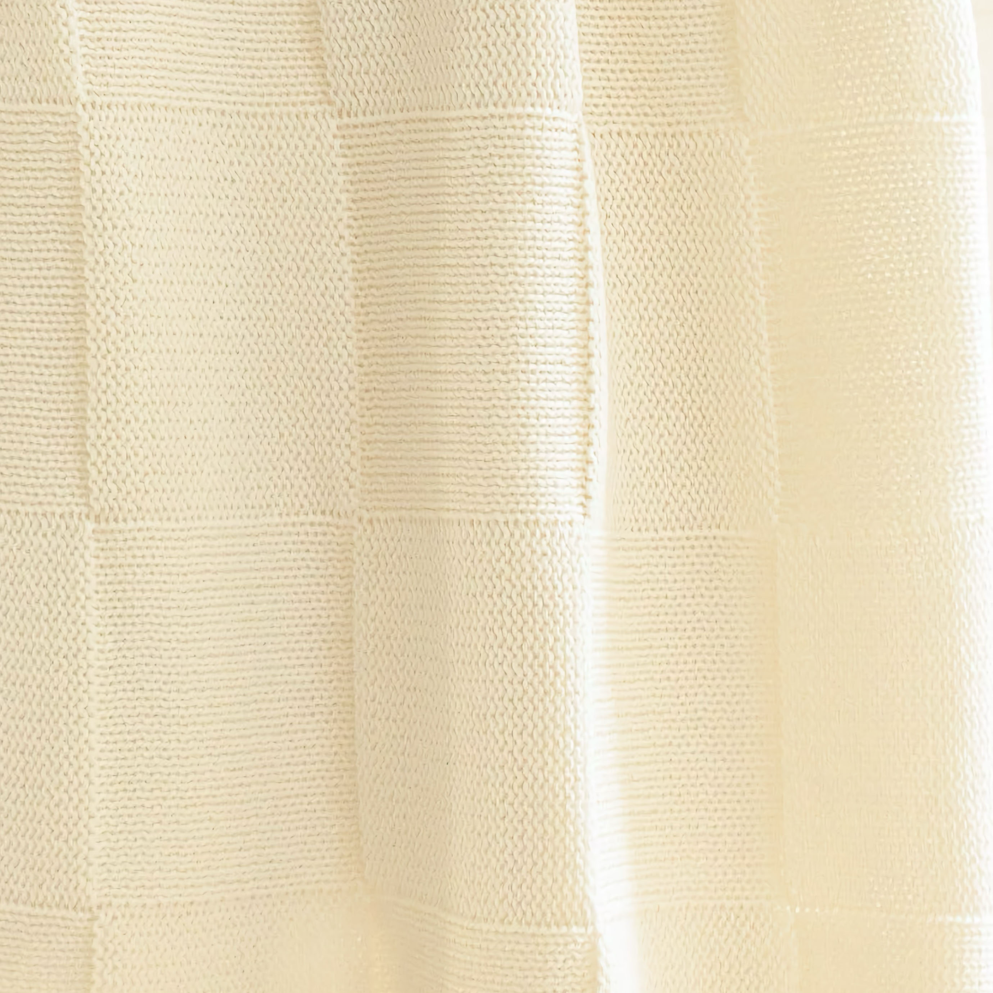 Stack of Alashan Charlie Knit Baby Blankets