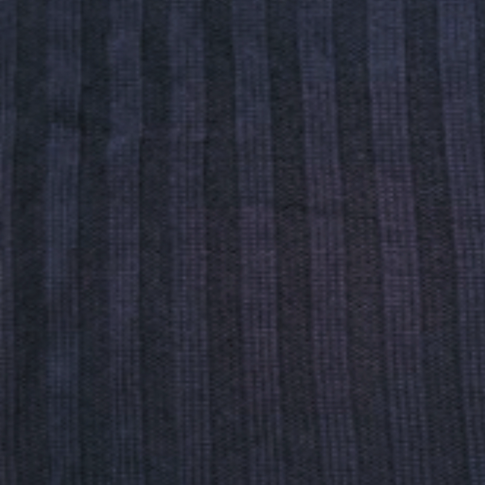 Alashan Chunky Rib Throw in Abyss on a chair