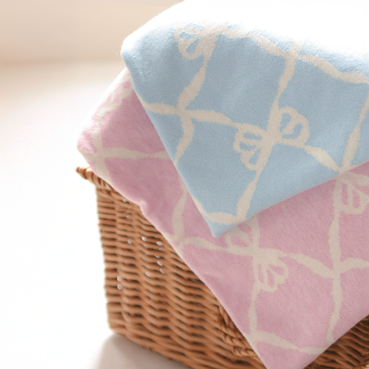 Two Colors of Alashan Ellis Bow Knit Baby Blanket