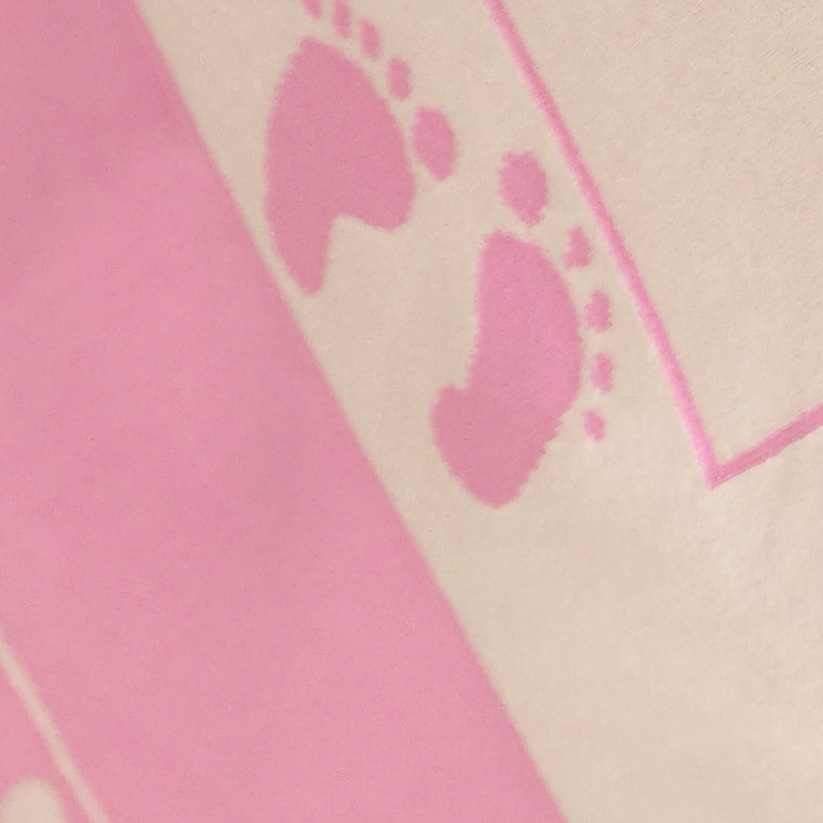 Fabric Closeup of Alashan Stevie Knit Baby Blanket in Bubble Gum