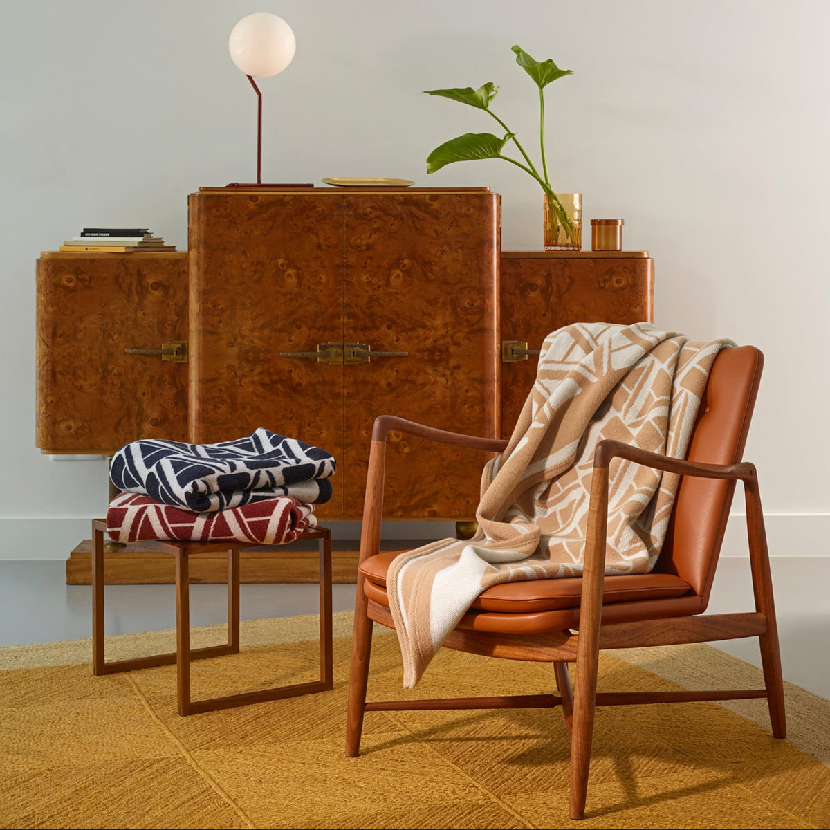 Amalia Ama Throws in Midnight, Burgundy and Sand colors
