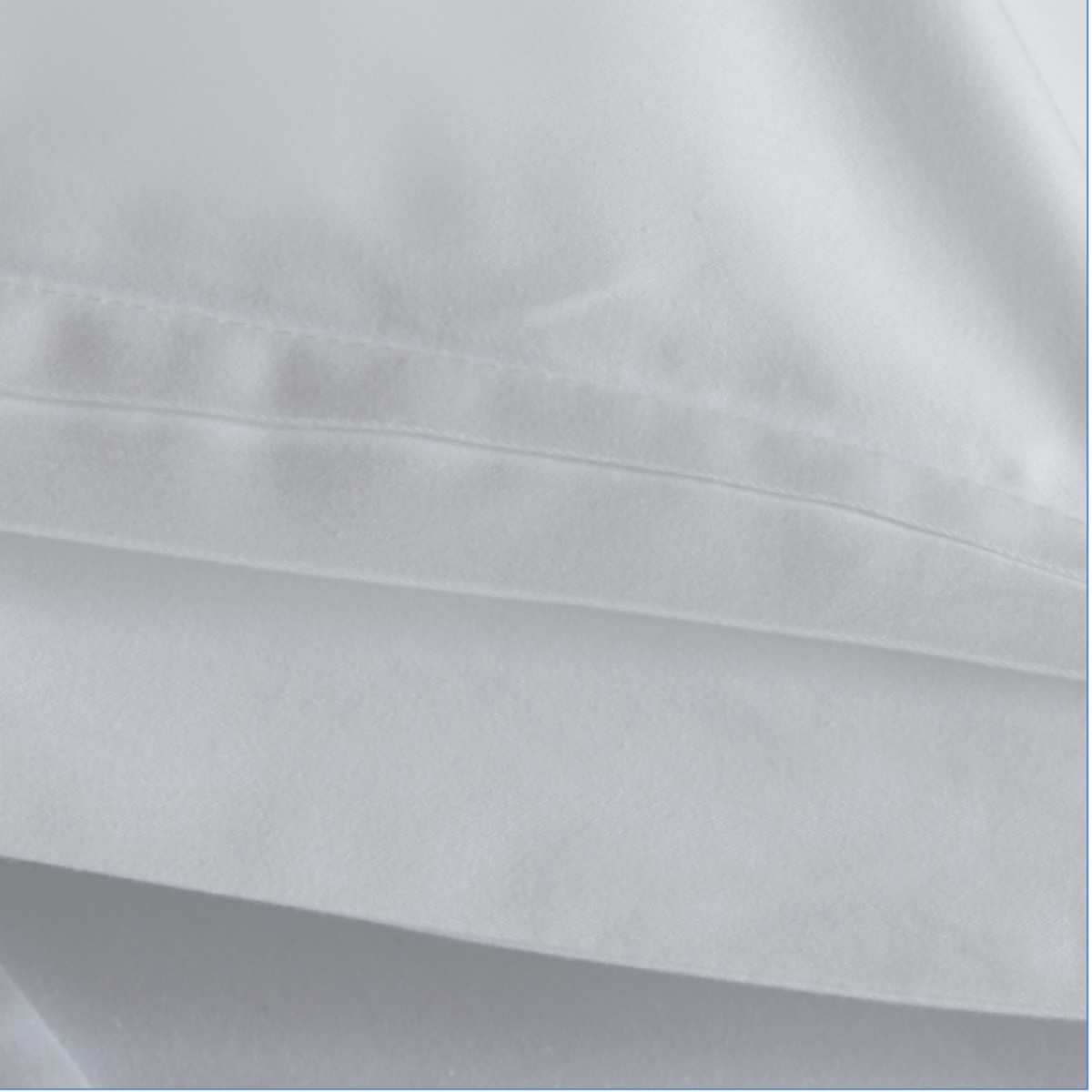 A close-up of White Amalia Eden Sea Island Cotton Bedding