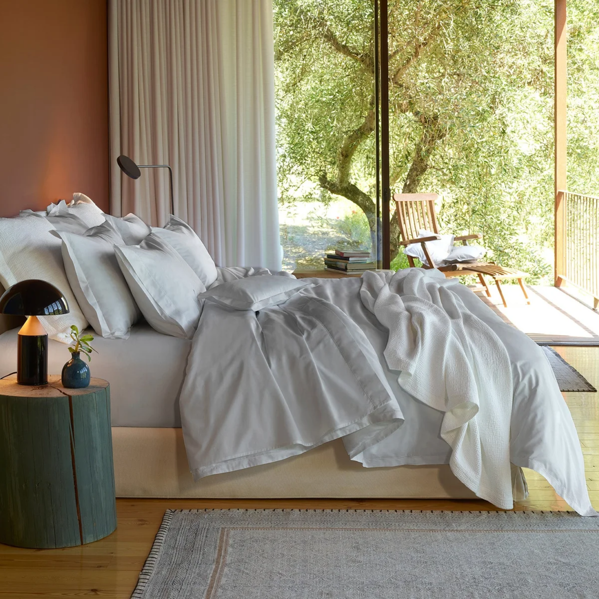A bed with Pale Grey Giza 94 Egyptian Cotton percale Amalia Fresco Bedding