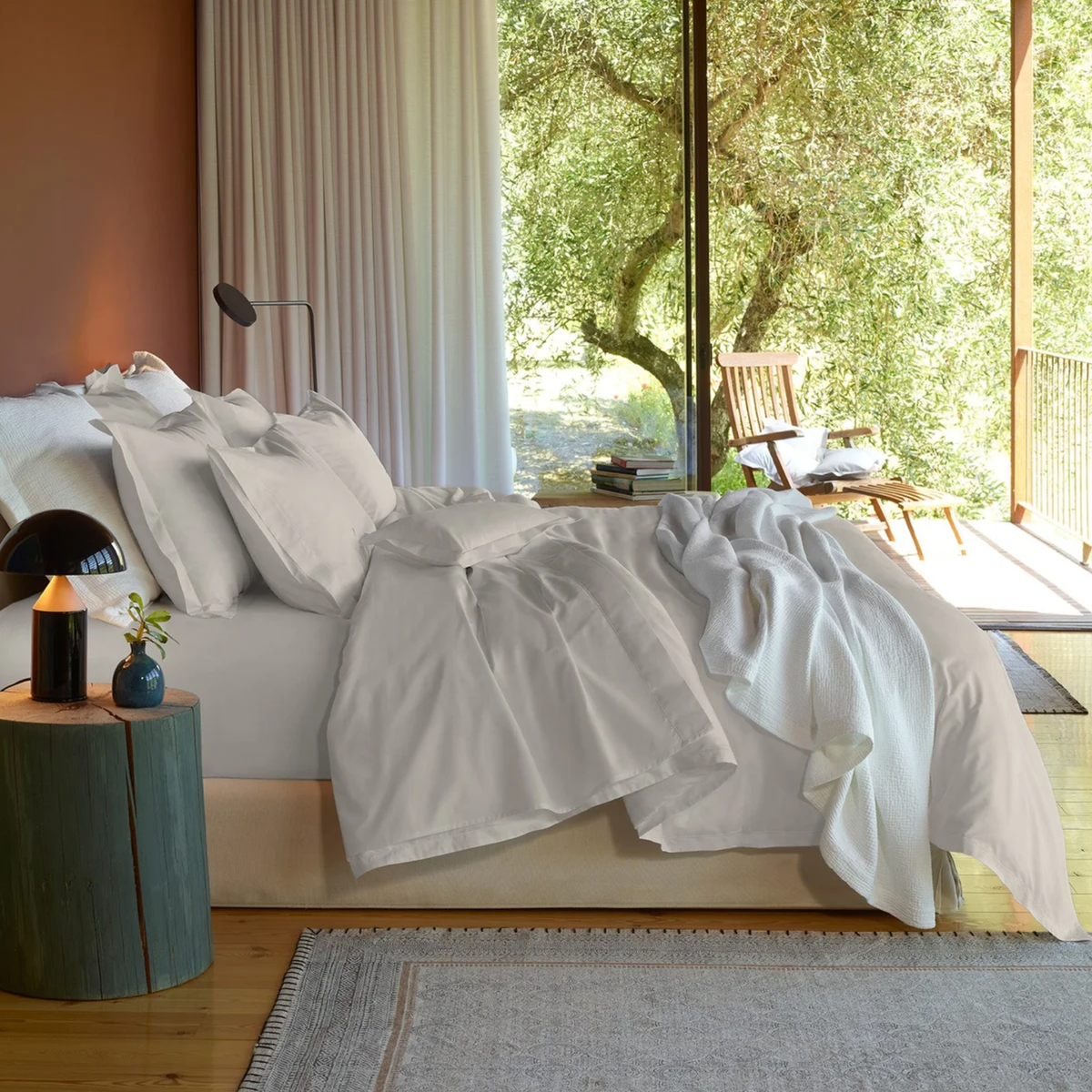 A bed with Sand Giza 94 Egyptian Cotton percale Amalia Fresco Bedding