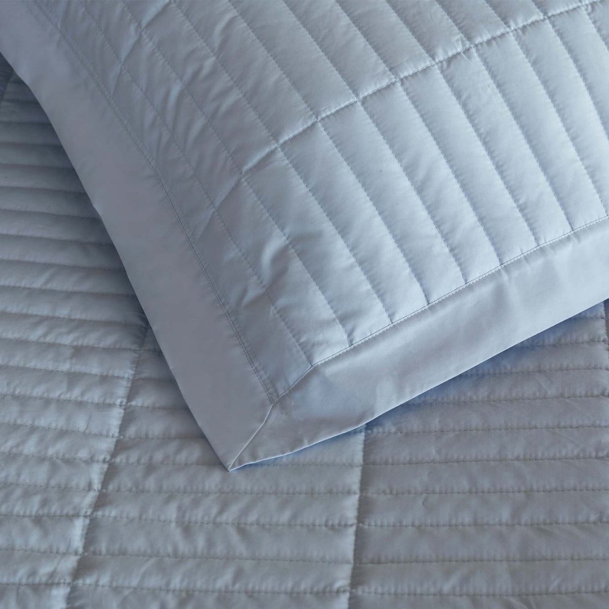 Closeup of Pale Blue Amalia Fresco Quilted Bedding