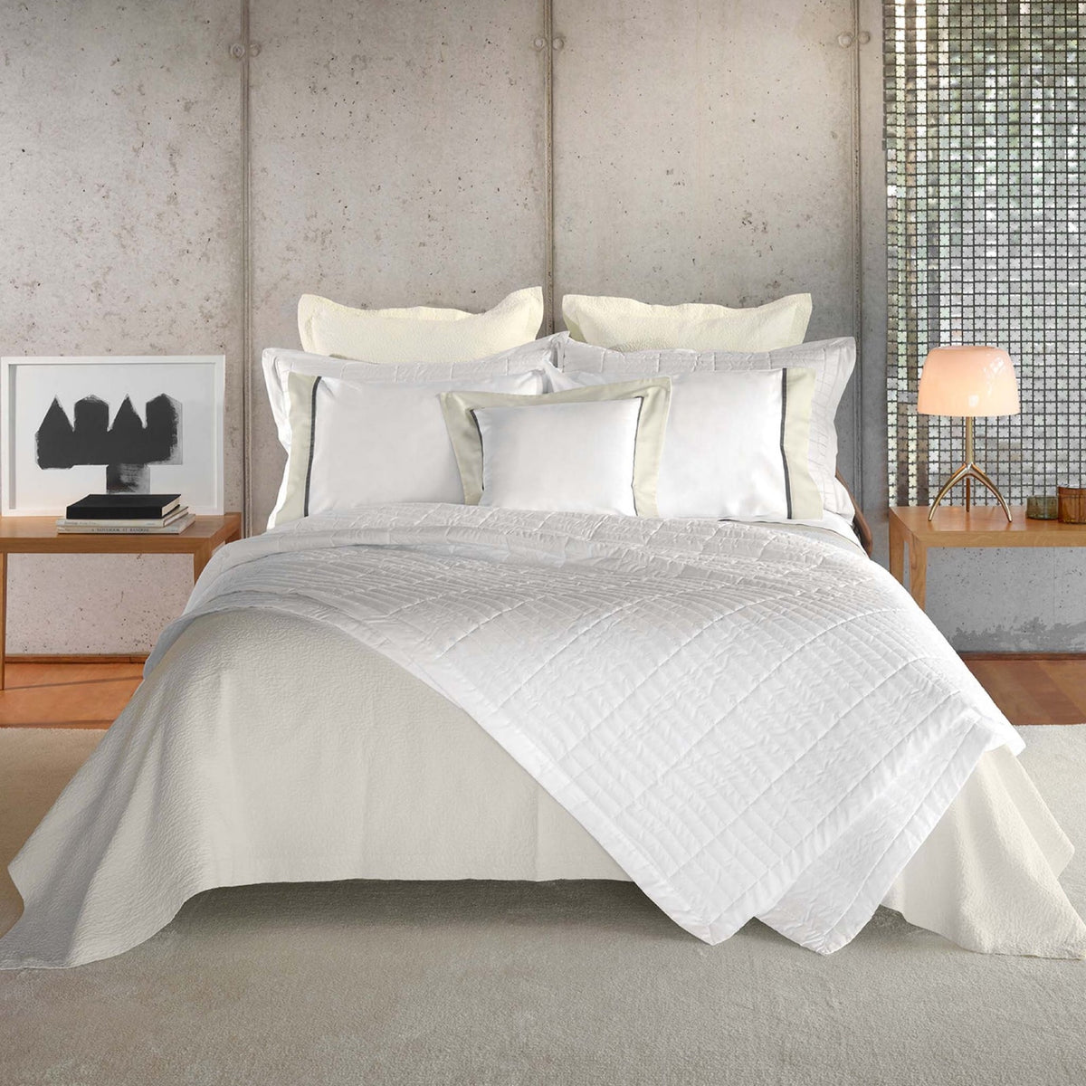 Bed with cream sheets and White Amalia Fresco Quilted Coverlet