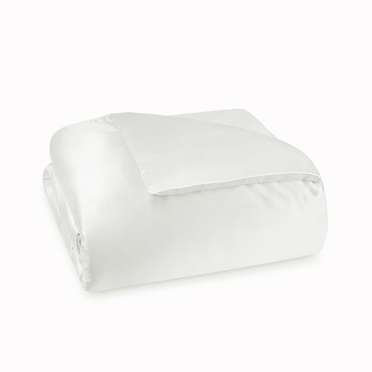 A neatly folded Duvet Cover of Natural Amalia Maria Mulberry Silk Bedding