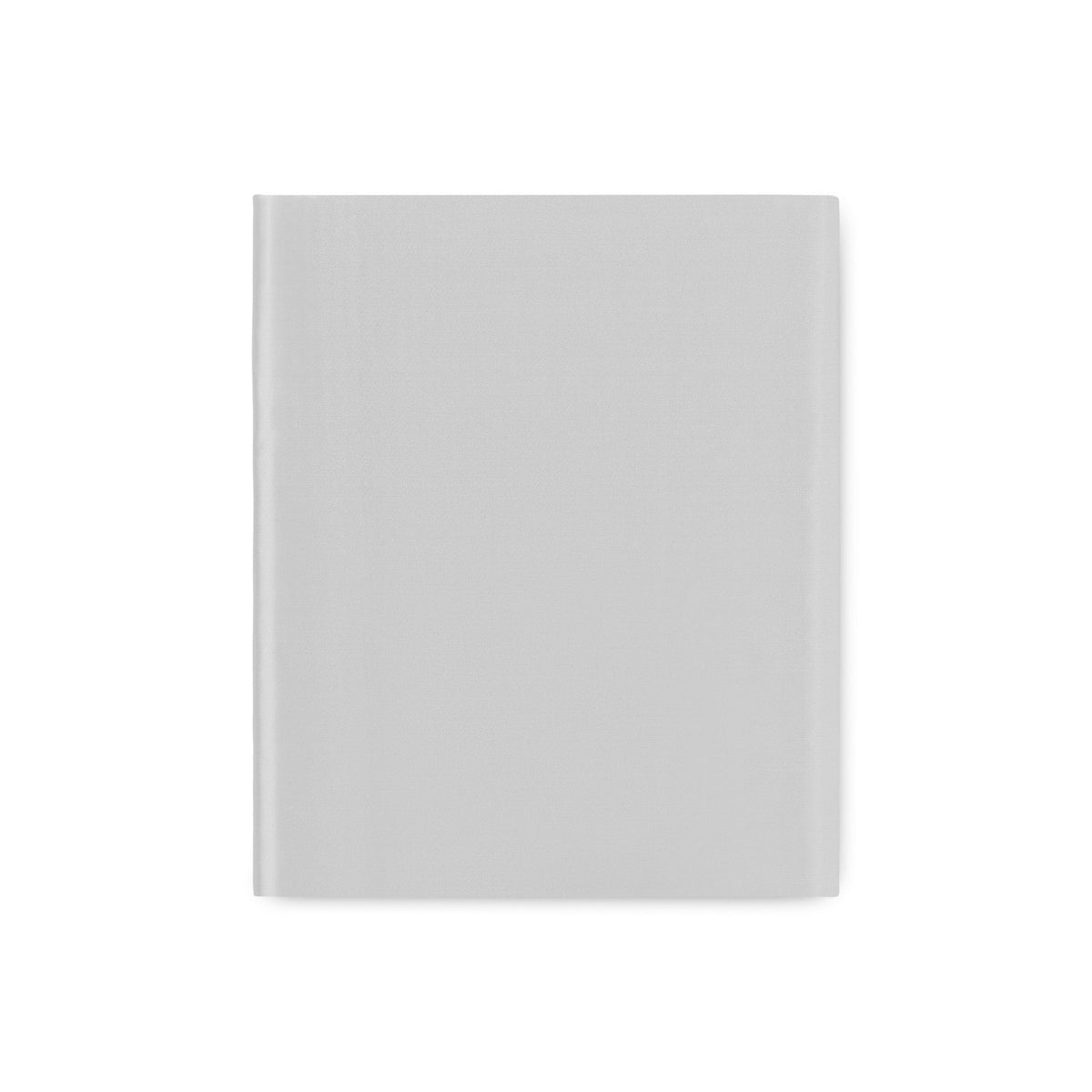 A folded Fitted Sheet of Silver Amalia Maria Mulberry Silk Bedding