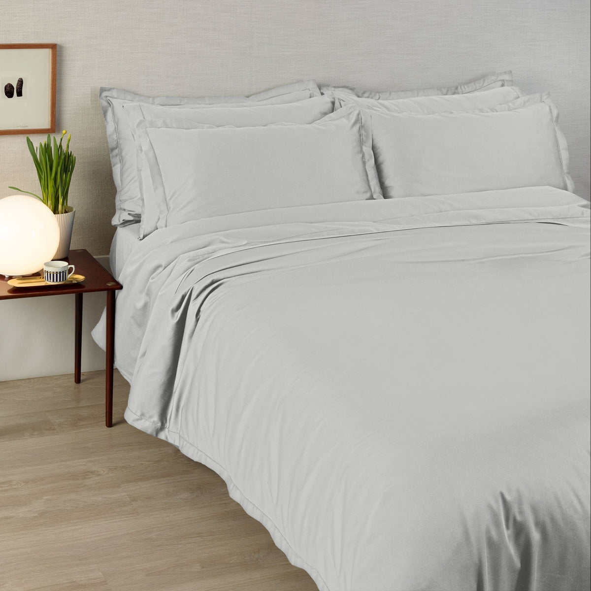 A bed made with 430 thread count Cool Grey Amalia Suave Giza 94 Bedding