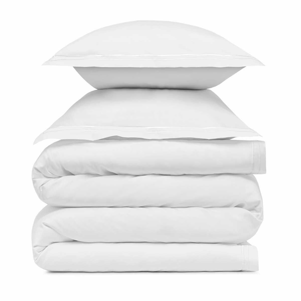 A stack of two white Amalia Sublime Giza 45 Cotton Bedding pillows resting on a neatly folded white duvet