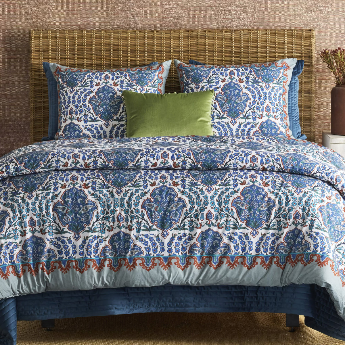 Teal colored Ann Gish Channel Velvet Coverlet Set with coordinate bedding and green pillow