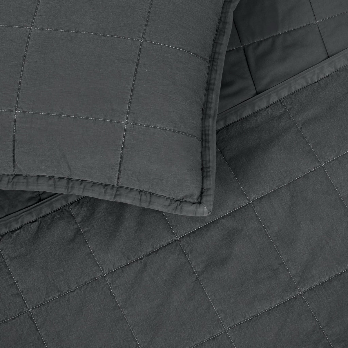 A close-up of Charcoal colored Ann Gish Cotton Canvas Coverlet Set
