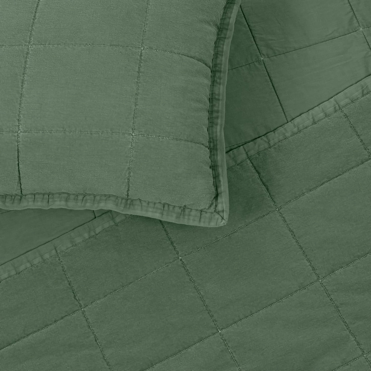 A closeup of Forest Green colored Ann Gish Cotton Canvas Coverlet Set