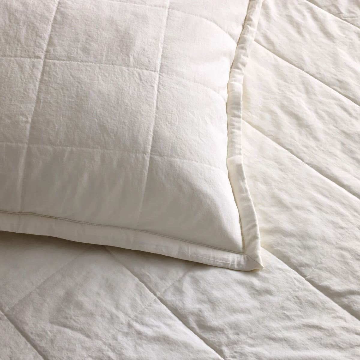 A close-up of Bone colored Ann Gish Cotton Canvas Coverlet Set