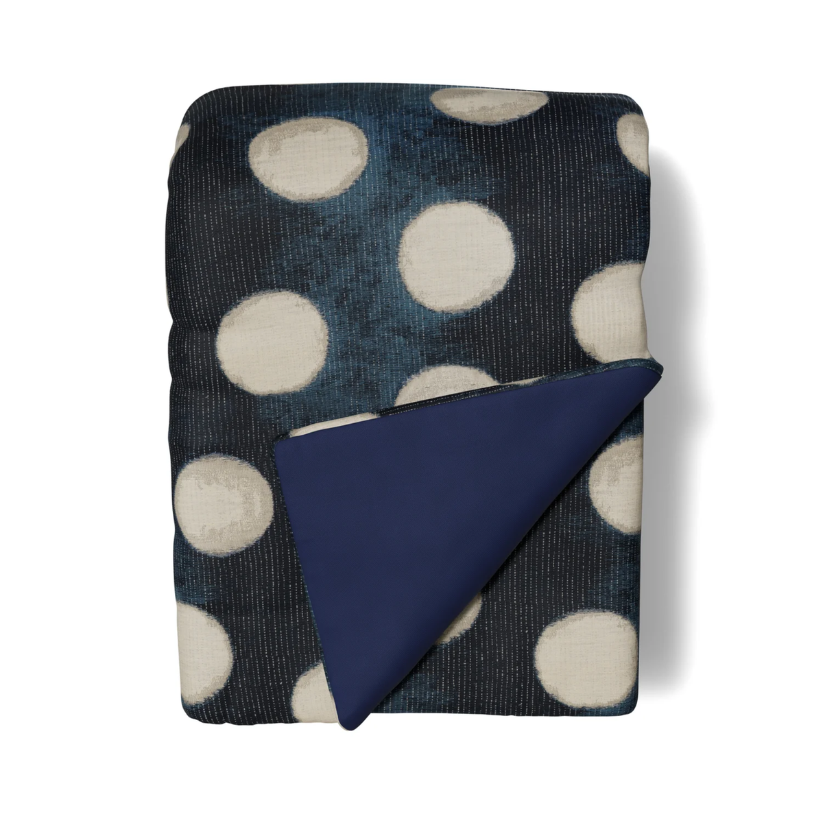Folded Ann Gish Eclipse Throw in Blue and Silver colors