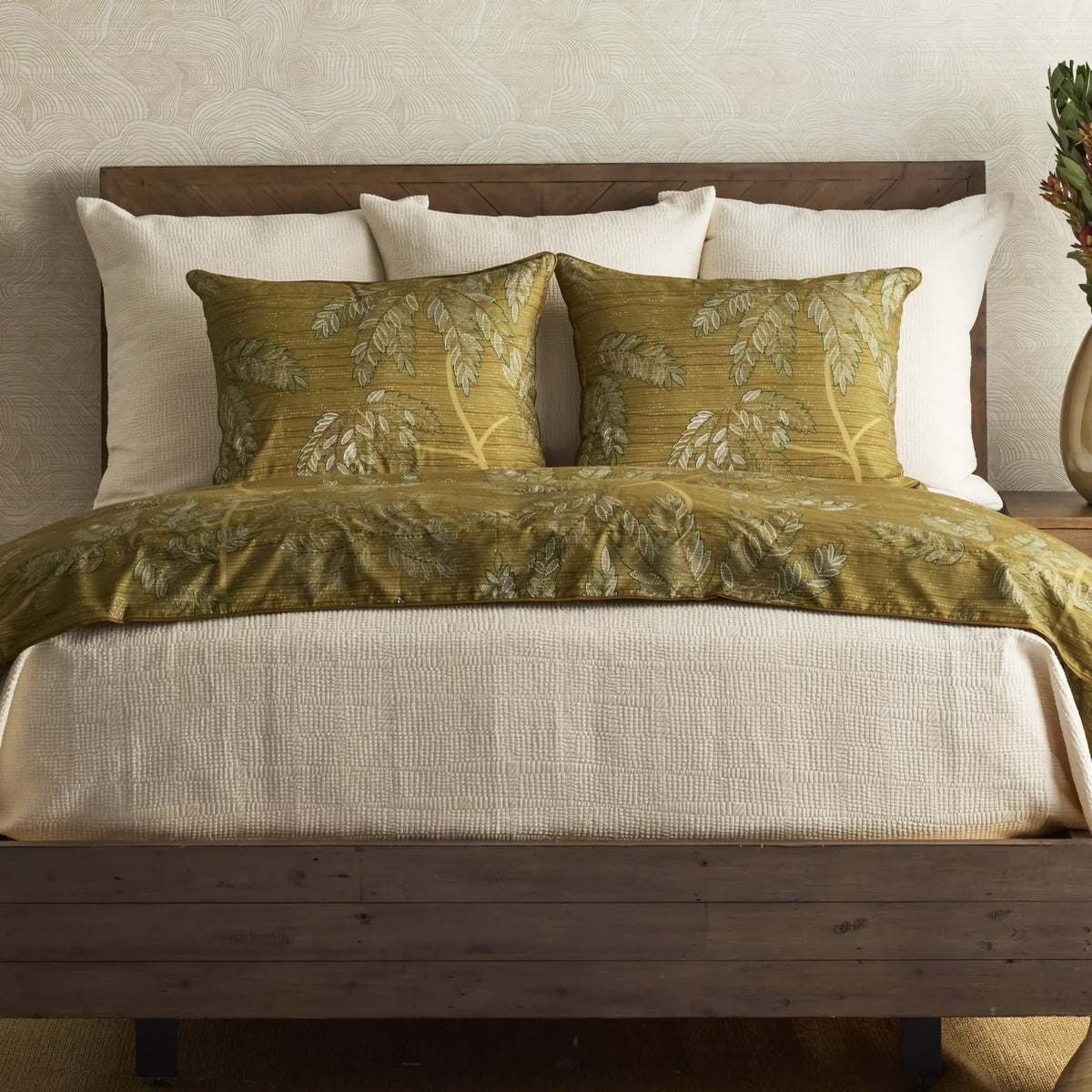 Green-colored Ann Gish Kaya Duvet Set with beige bedding coordinate