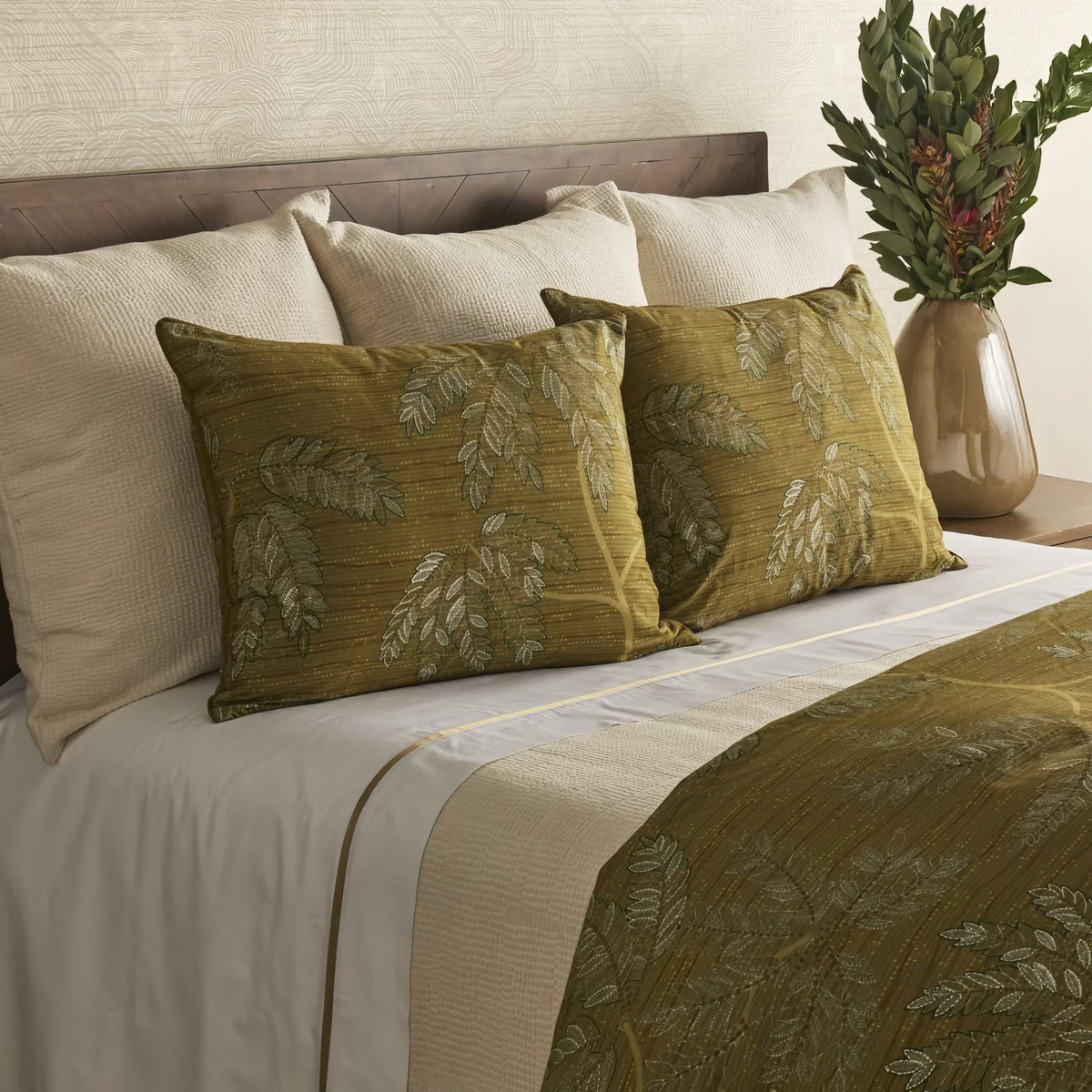 Side view of Green-colored Ann Gish Kaya Duvet Set with beige bedding coordinate