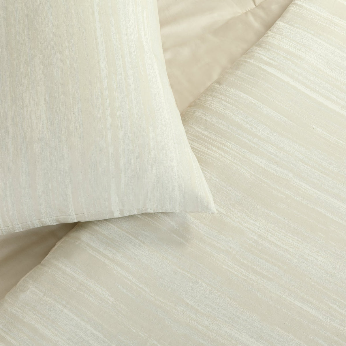 Detailed view of Pearl-colored Ann Gish Palais Comforter Set