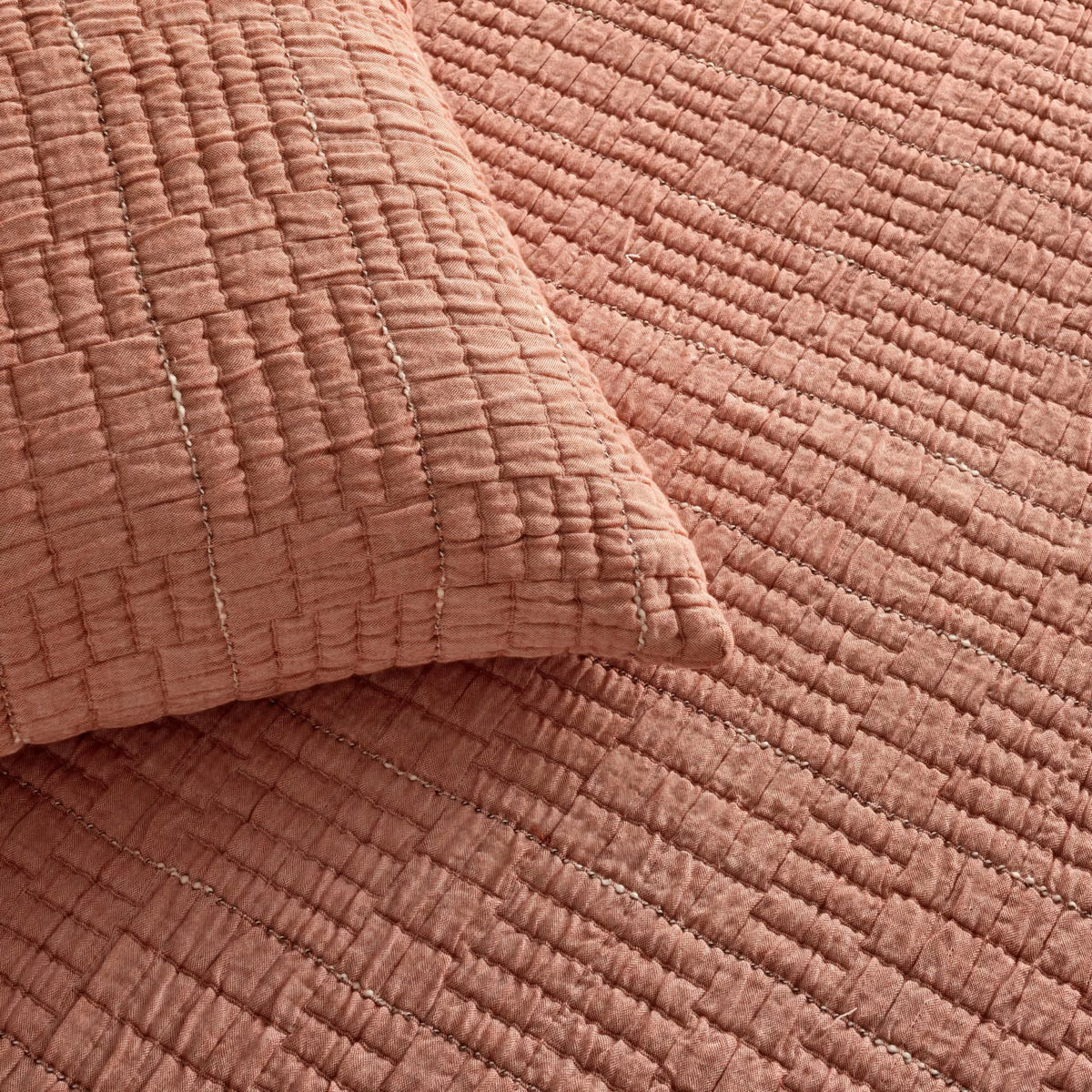 Detailed view of Terra Cotta colored Ann Gish Pickstitch Coverlet Set