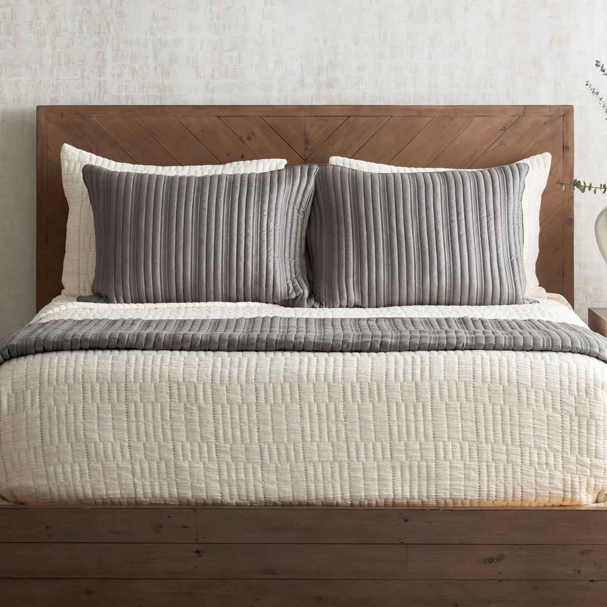 Bed with Bone Pickstitch and Slate colored Ann Gish Rib Coverlet Set