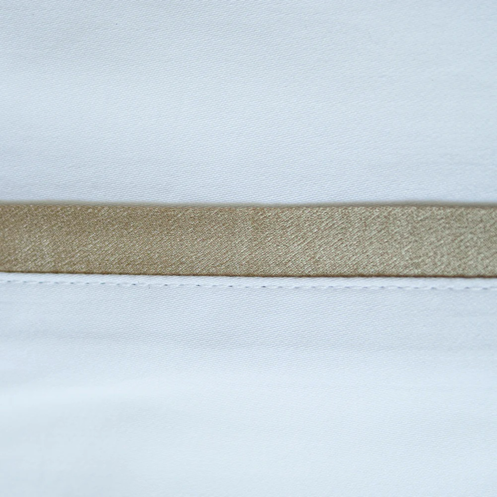 Side View of Ann Gish Silk Trim Bedding with Mystery Swatch