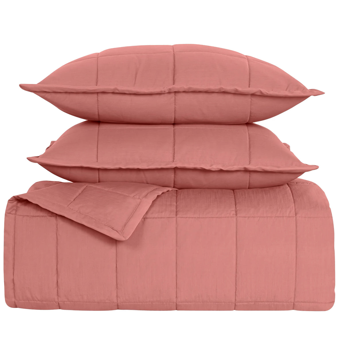 Stack of Persimmon colored Ann Gish Slub Tencel Quilted Coverlet Set