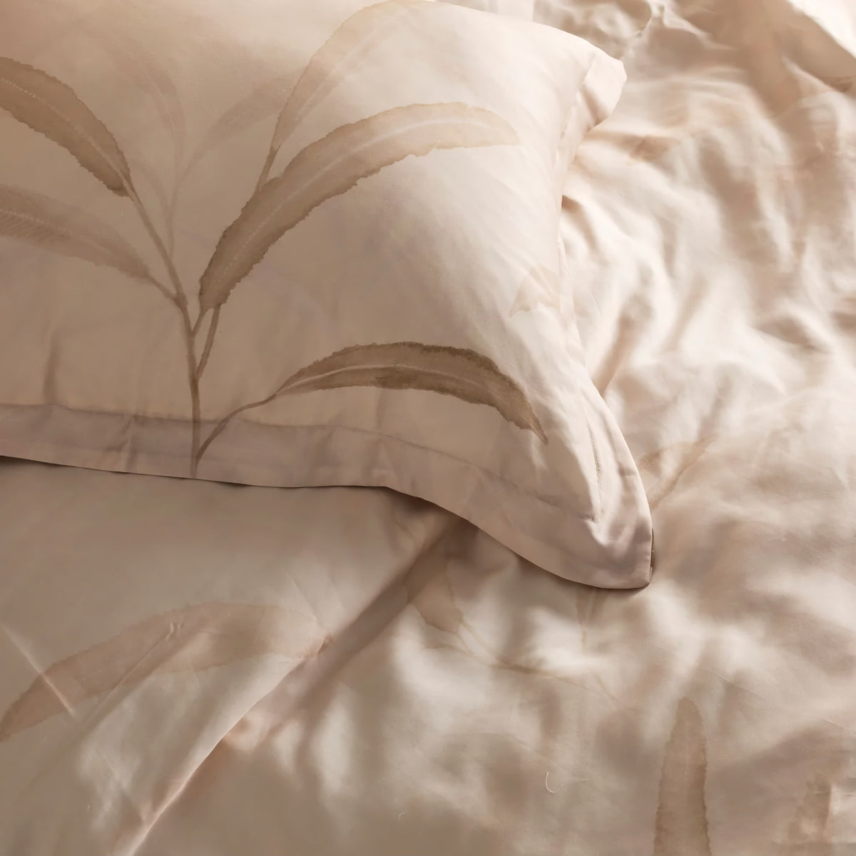 Closeup of Bone and Taupe-colored Ann Gish Willow Duvet Set