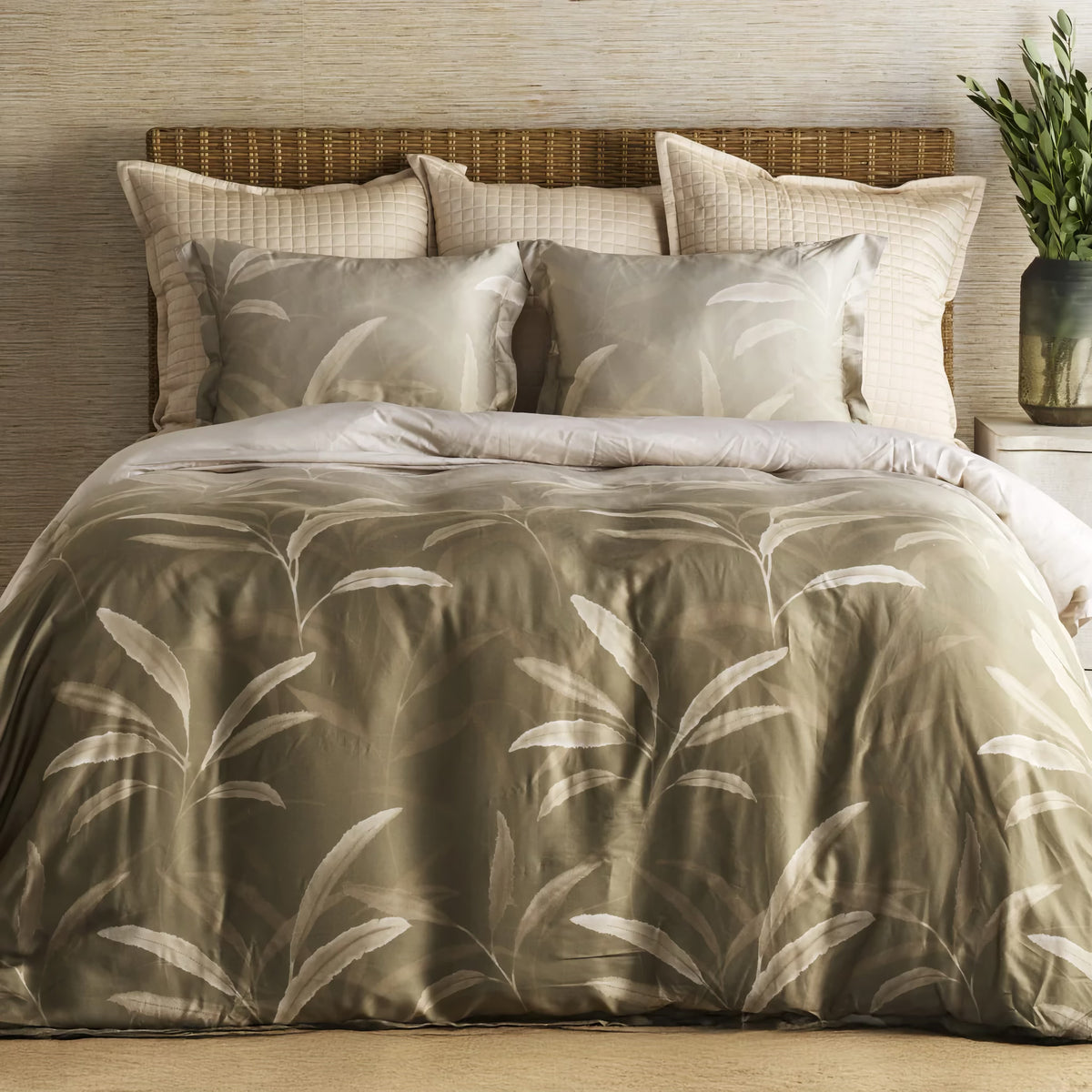 Sage-colored Ann Gish Willow Duvet Set with bedding coordinate