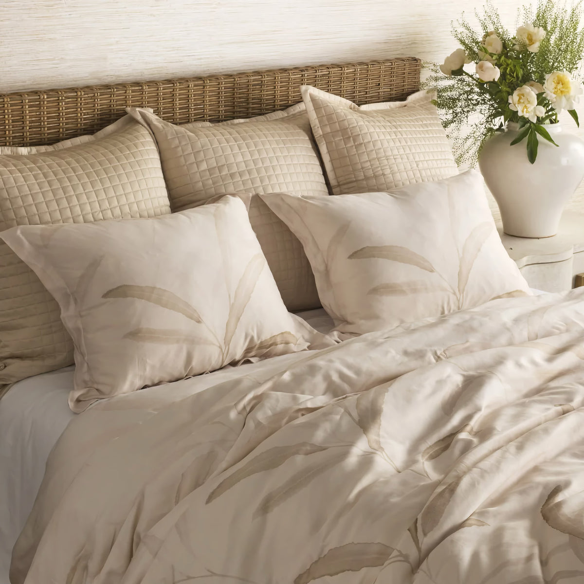 Side view of Bone and Taupe-colored Ann Gish Willow Duvet Set with bedding coordinate
