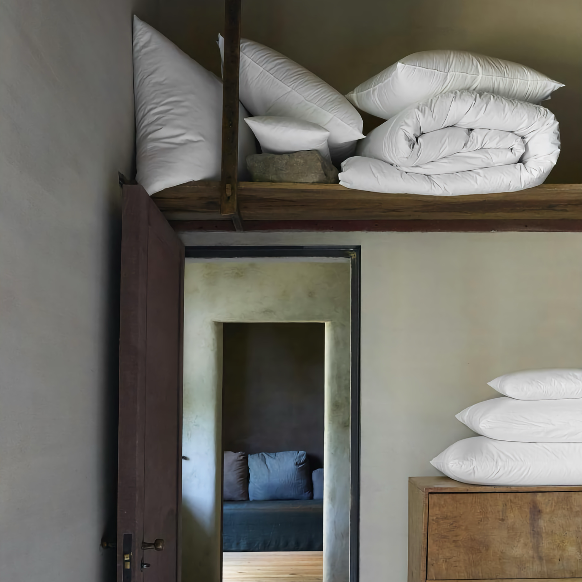 An Assortment of Pillows and Comforters from Matouk Down Collections