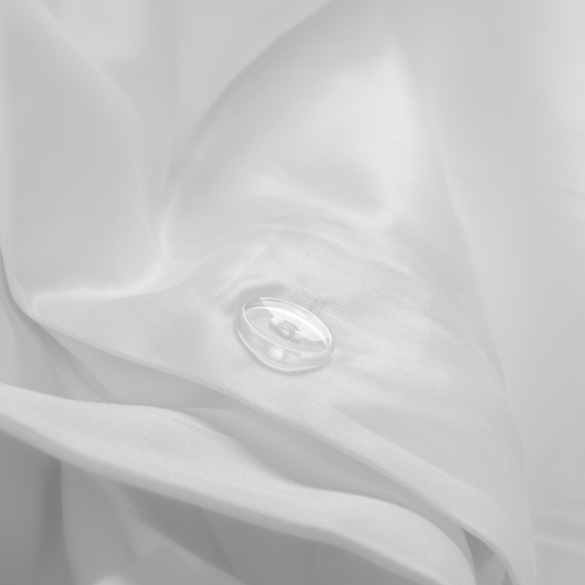 Closeup of BOVI Luxor Bedding in White